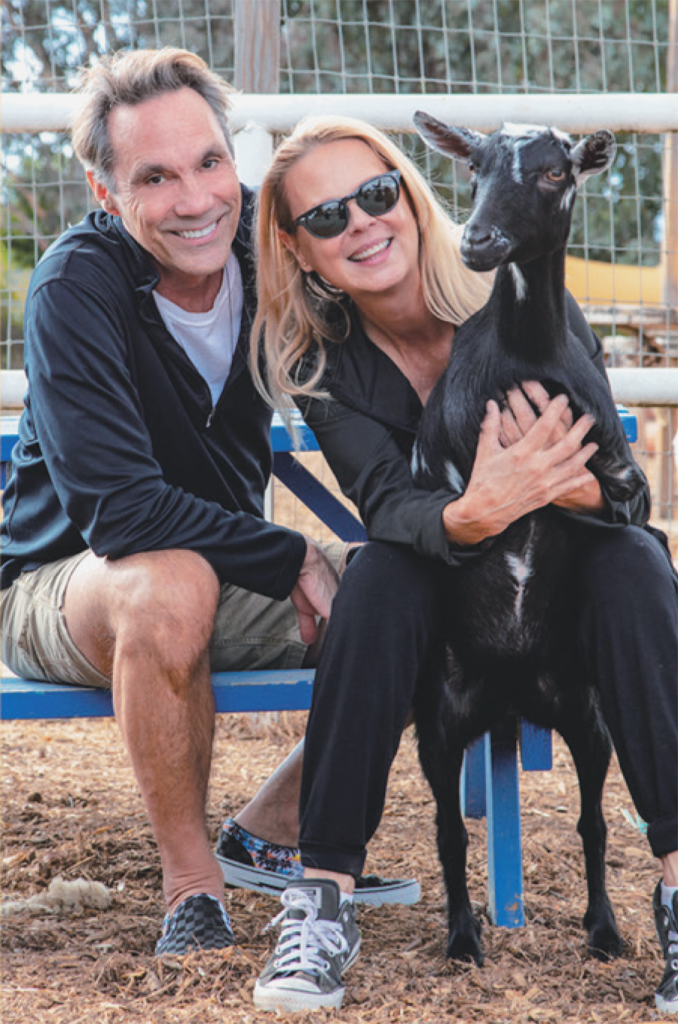 portrait of the writers Caroline and Frank with their beloved goat Tinky